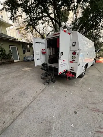 Magnet Plumbing service vehicle on-site for Sewer Line Repair in Zachary