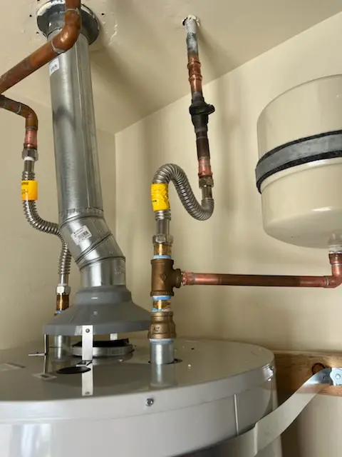 Water heater installation and plumbing repair in Zachary
